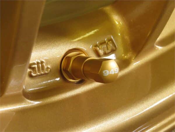 Gold wheel rim valve close-up