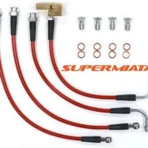 Red aftermarket brake lines for vehicles, with fittings.