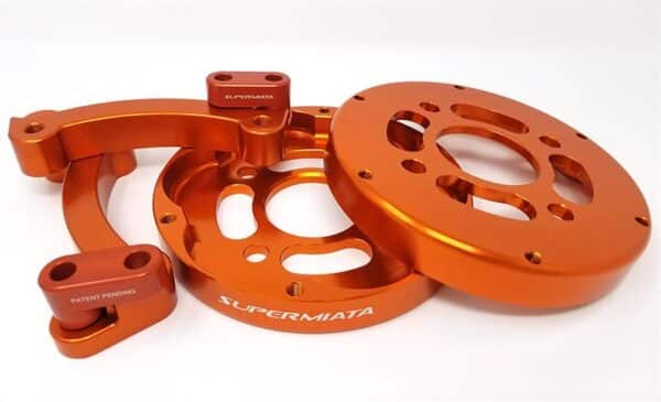 Orange anodized car performance parts.
