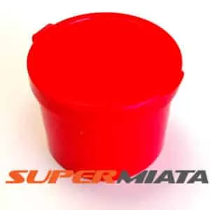 Red plastic container with SUPERMIATA branding.