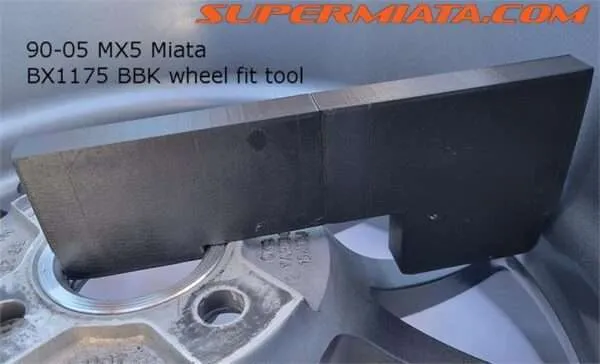 MX5 Miata wheel fitment tool on brake disc.