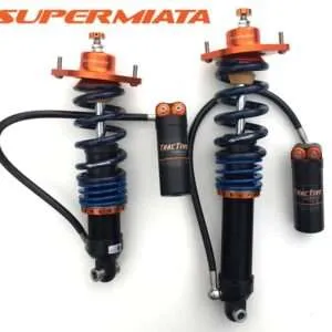 Adjustable car suspension system components displayed.