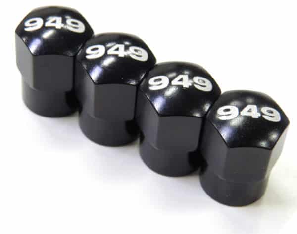 Black dice with 949 numbering on white background.