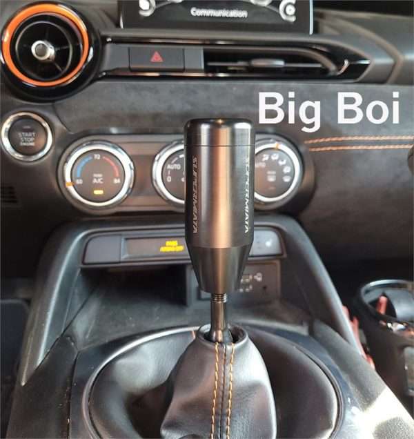 Car manual gearbox with custom gear shift knob.